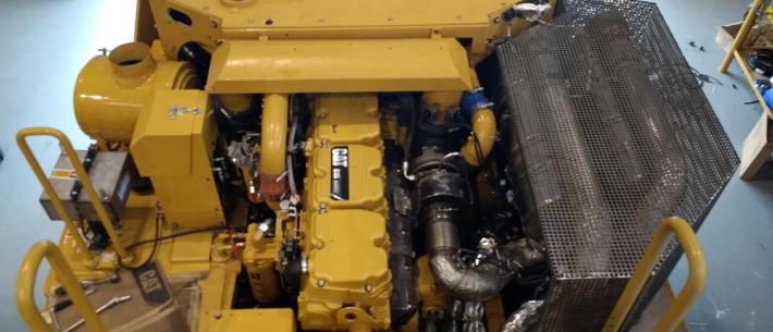 HJS retrofitopbouw op een Caterpillar 