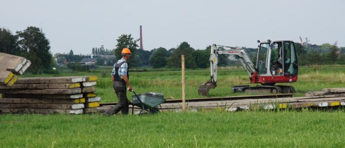 Werknemer en kraantje