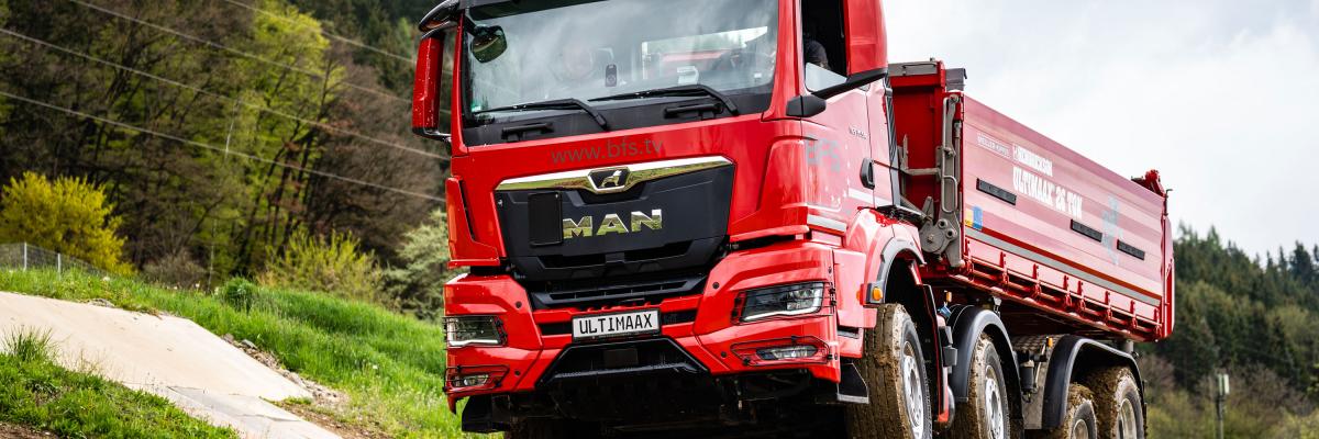 MAN bouwvoertuig met Ultimaax vering
