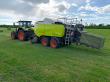 Claas Quadrant evolution grootpakpers in gras 